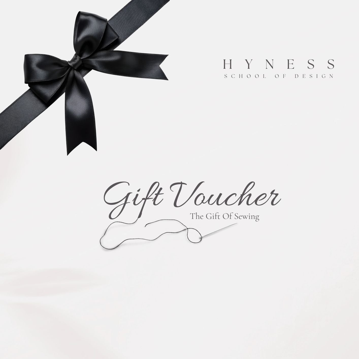 Gift voucher with a black ribbon on a white background, featuring 'Hyness School of Design'.